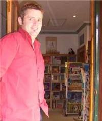 James Williams at the shop door
